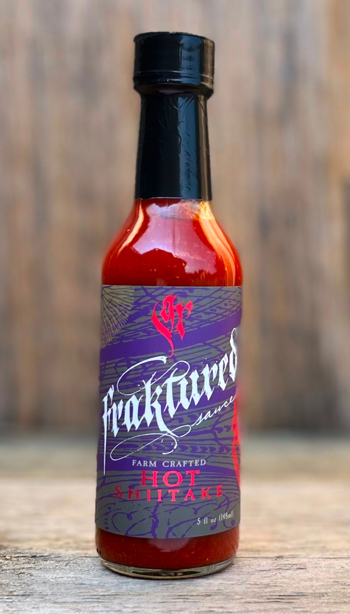Fraktured Sauce Hot Shiitake extra hot sauce with fermented and aged pepper mash and deep umami from shiitake mushrooms
