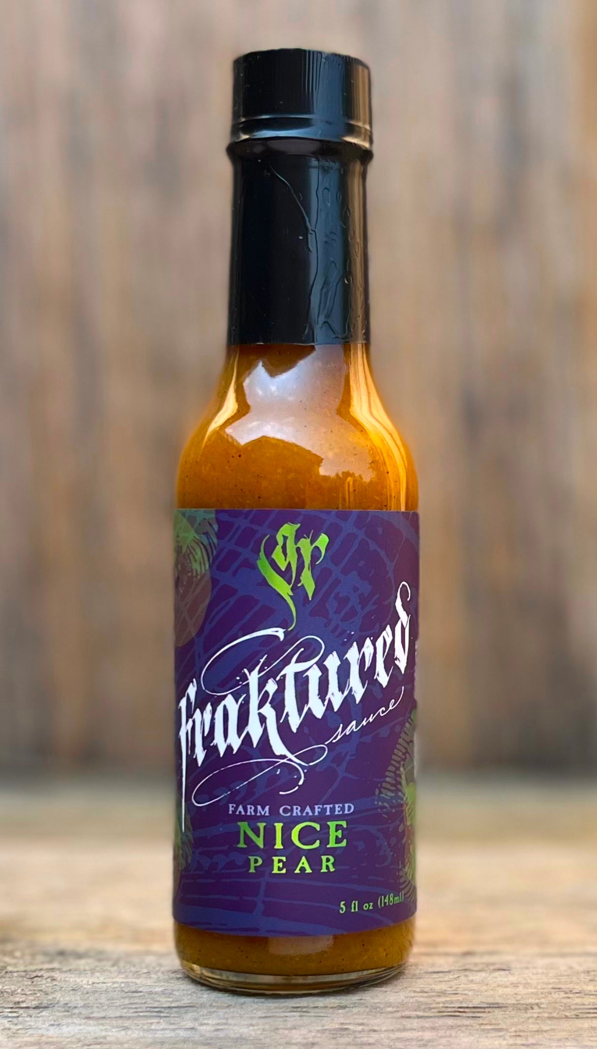 Fraktured Sauce Nice Pear sweet and spicy hot sauce with fresh pear warm spices and fermented aged pepper mash