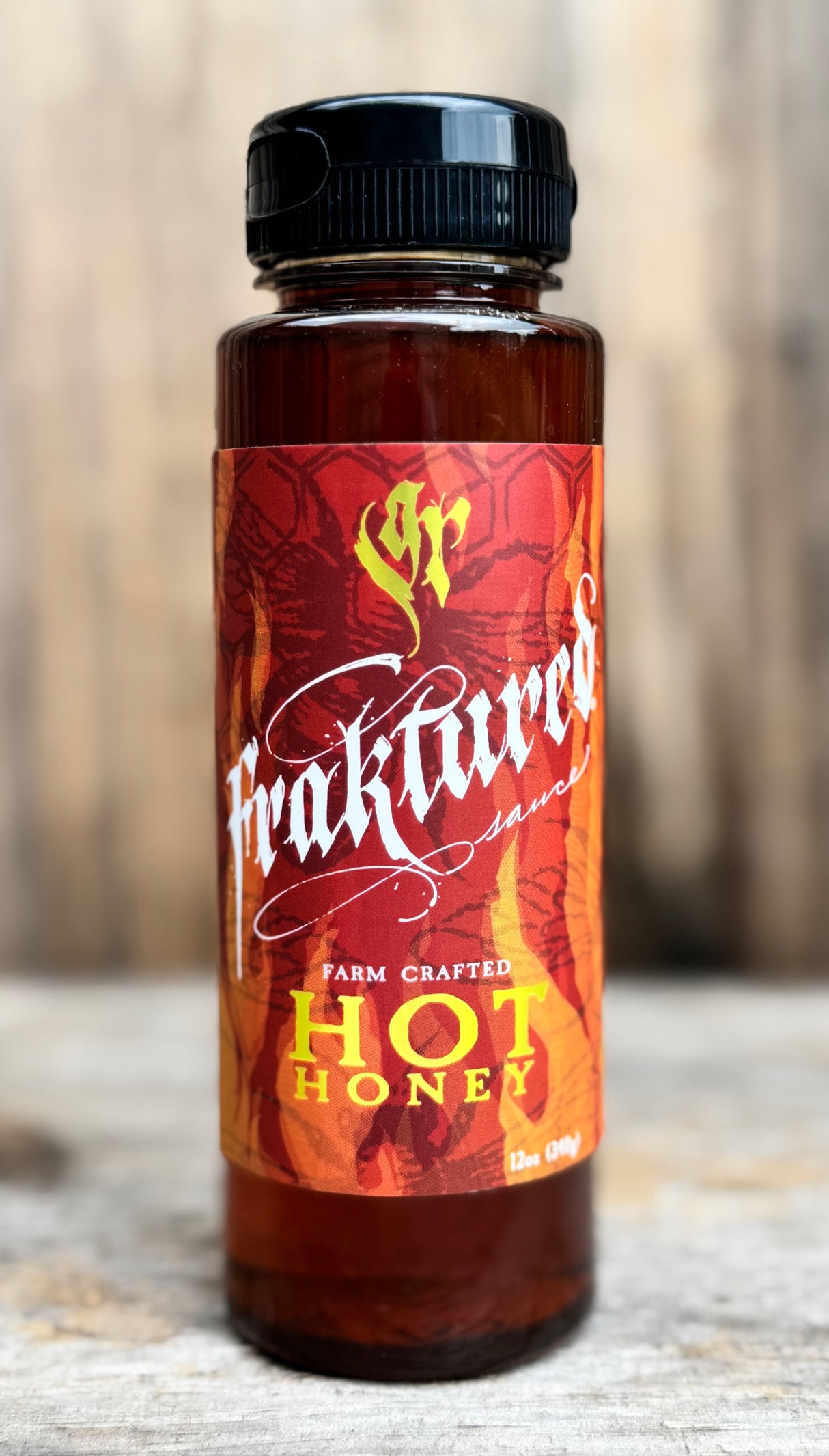 Fraktured Hot Honey made with raw honey, Scotch Bonnet and Habanero peppers.